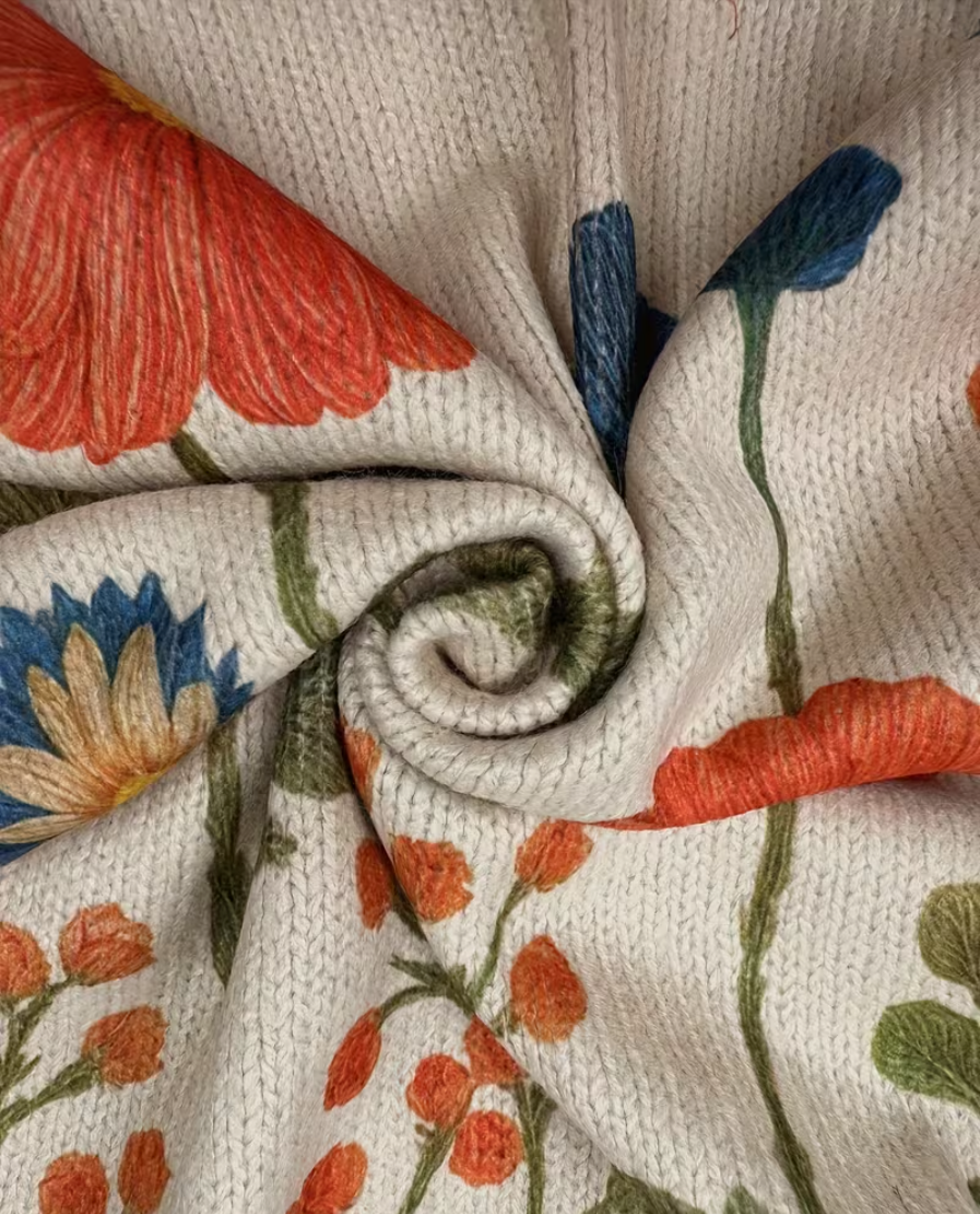 Ariel – Strickjacke mit Wildblumenmuster und Reißverschluss
